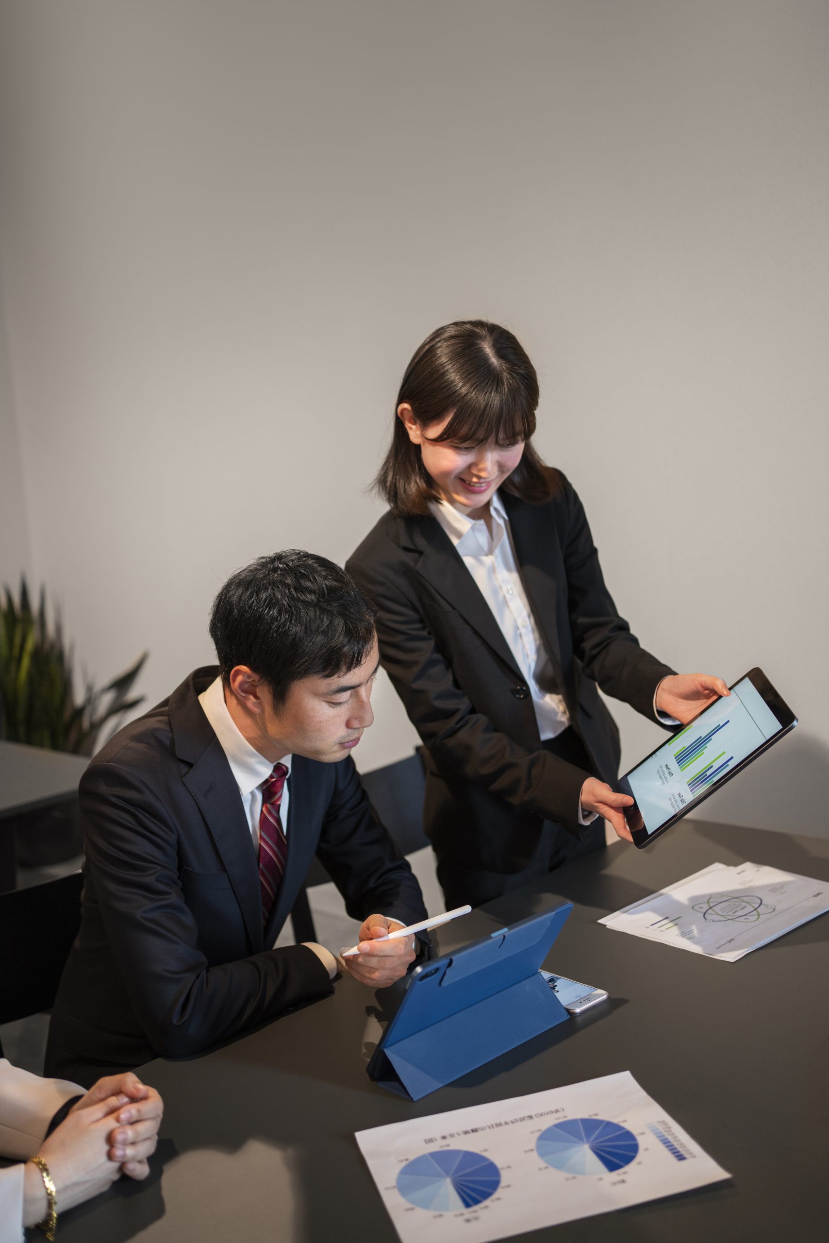 business-people-working-with-ipad-high-angle https://demo.syntrio.in/syntrioor/wp-content/uploads/2025/09/business-people-working-with-ipad-high-angle-scaled.jpg